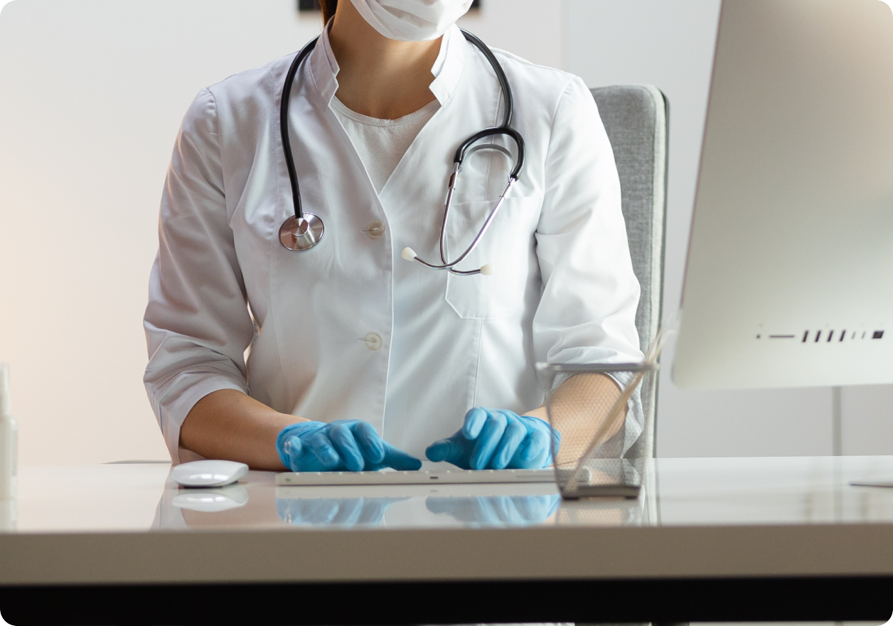 A Nurse or doctor at the computer
